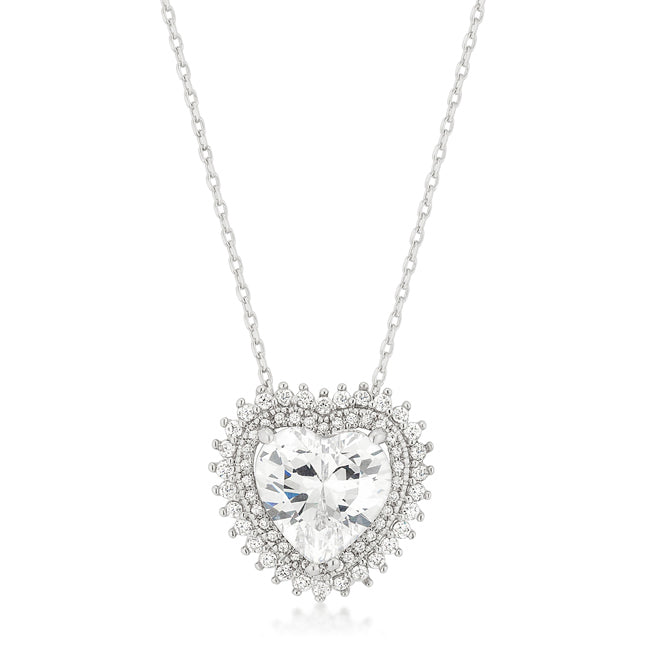 Heart-shaped pendant with pave-set cubic zirconia stones on a chain, laid flat