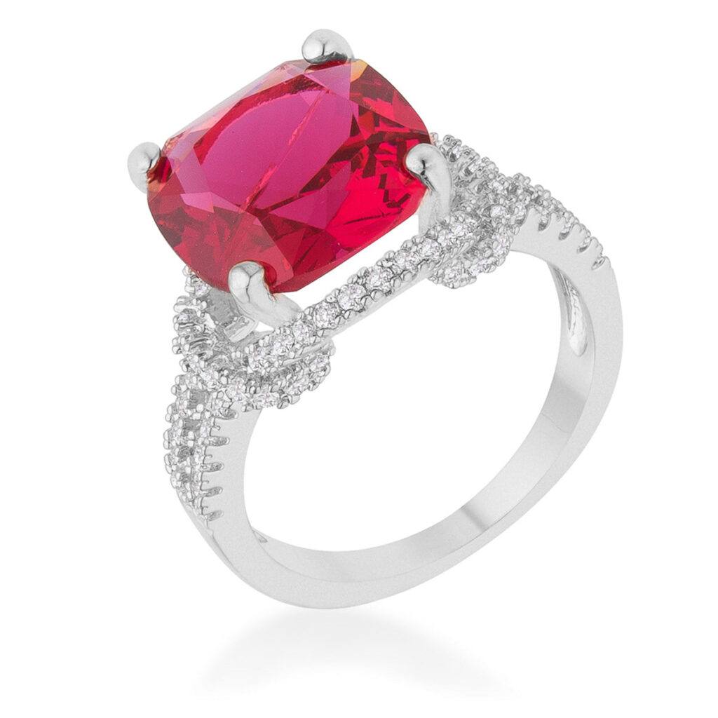 Round ruby-colored cubic zirconia ring in a prong setting on a rhodium plated band