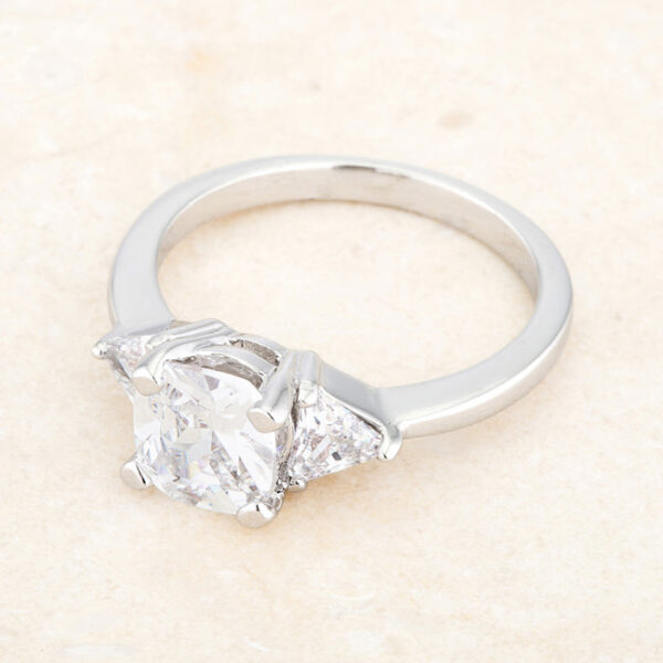 Full view of the ring standing upright, showing the complete cushion cut design