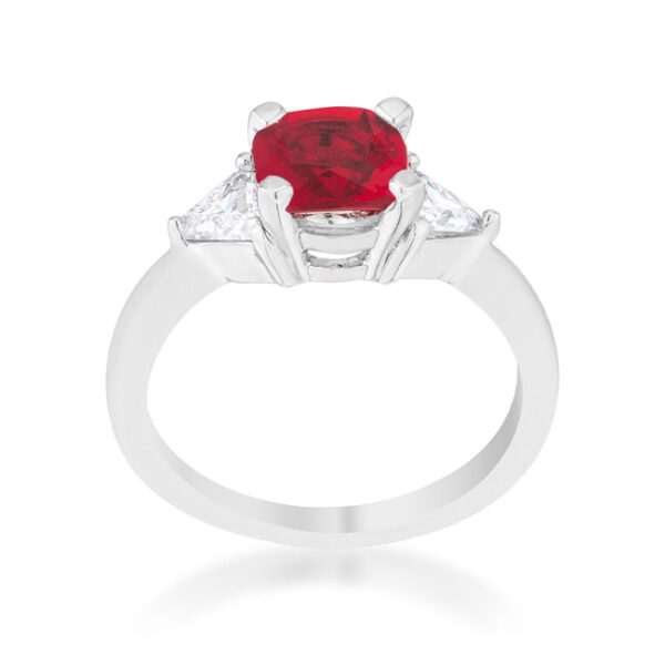 Close-up of the prong setting holding the garnet-colored cushion cut center stone