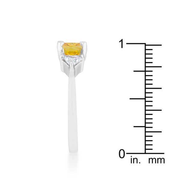 Top-down view of the ring showing the canary cushion cut center stone in its prong setting