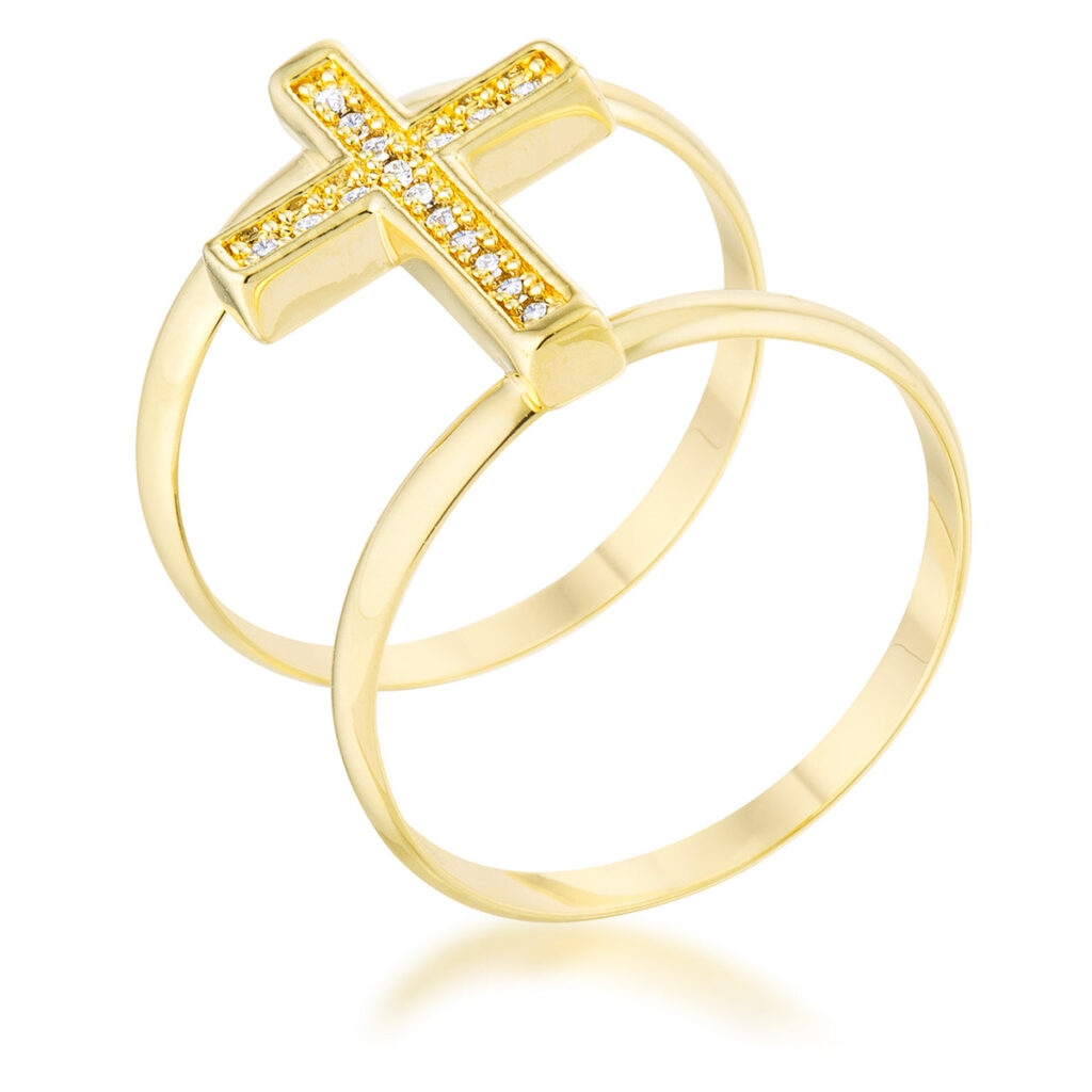 Cross-shaped ring with an open design and small round stones set closely across the band
