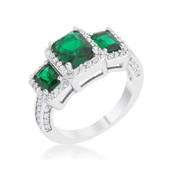 Ring with pave-set emerald-colored cubic zirconia stones catching light across a rhodium plated band