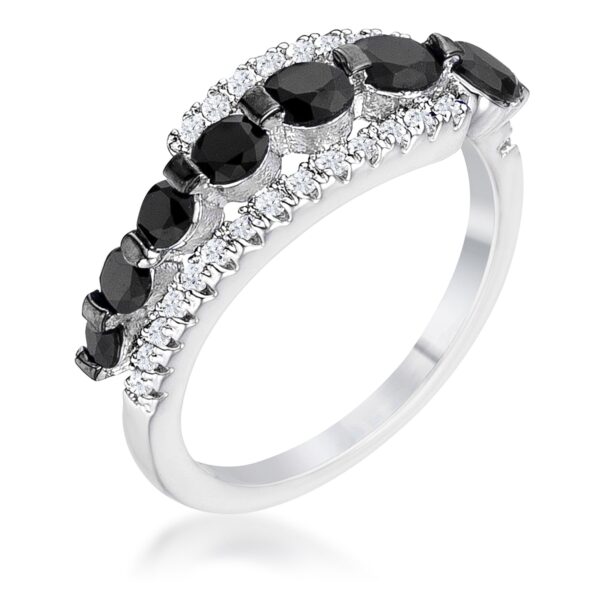 Ring with graduated round cubic zirconia stones stepping across a rhodium plated band