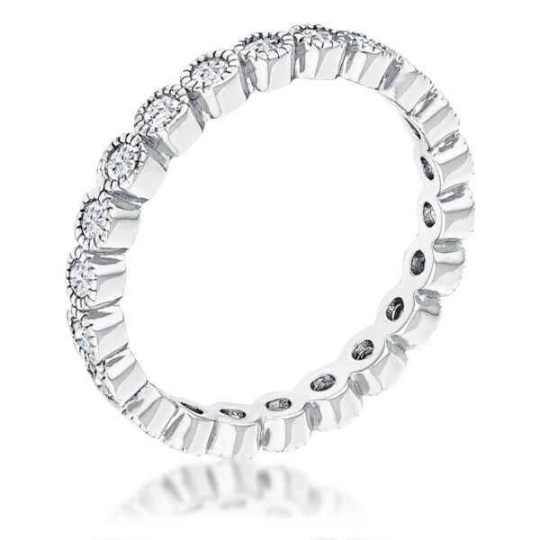 Rhodium plated eternity ring with clear round CZ stones set in a dotted bezel band