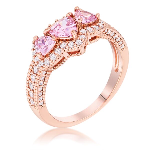 Rose goldtone ring with three angled pink trillion cut CZ stones in a pave halo setting