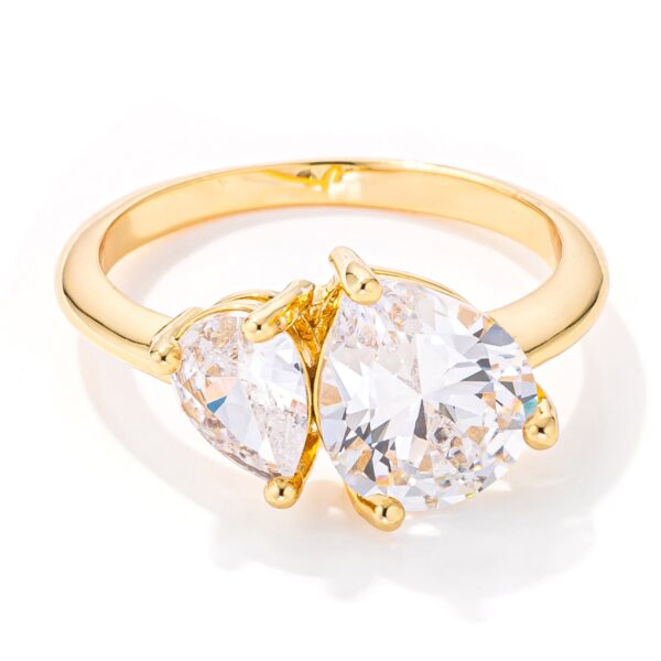 Gold plated Toi et Moi ring with two pear-cut cubic zirconia stones set side by side