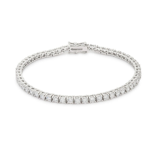 Silvertone tennis bracelet with a row of round cubic zirconia stones set in prongs, laid flat