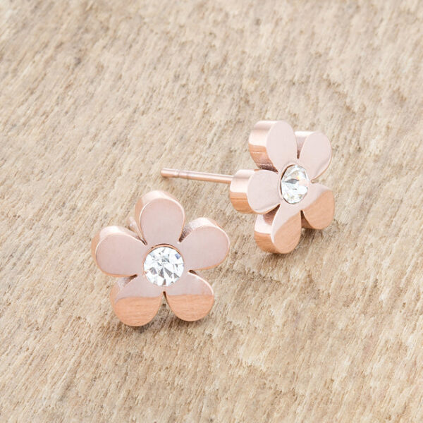 Pair of rosegold flower stud earrings placed side by side on a plain background
