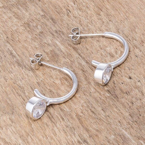 Drop hooplet earrings displayed at an angle showing the hoop shape and post backing
