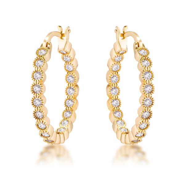 Goldtone plated hoop earring with a dotted bezel of clear round cubic zirconia stones