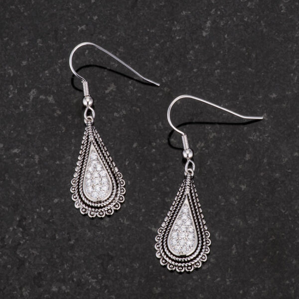 Close-up of cubic zirconia stones in the tear drop earring setting