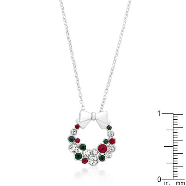 Close view of the holiday wreath pendant showing crystal placement and rhodium plated finish