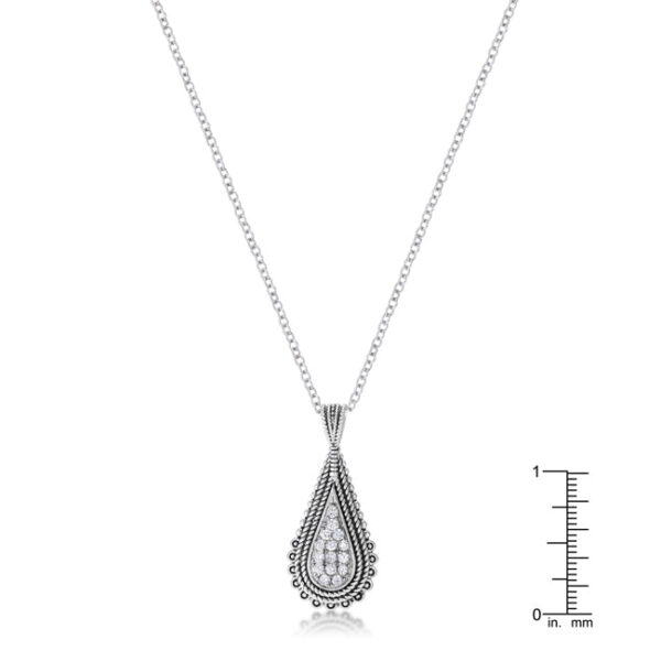 Teardrop pendant necklace viewed at an angle, highlighting the rhodium plated metal's reflective surface