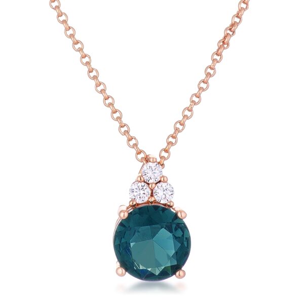 Rose gold plated pendant with a round blue green cubic zirconia stone and smaller accent stones