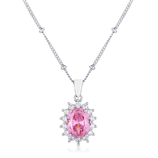 The pendant with a pink stone set at its center