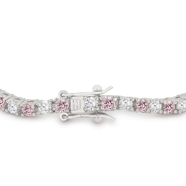 Close-up of prong-set pink cubic zirconia stones on the bracelet showing the rhodium plated finish