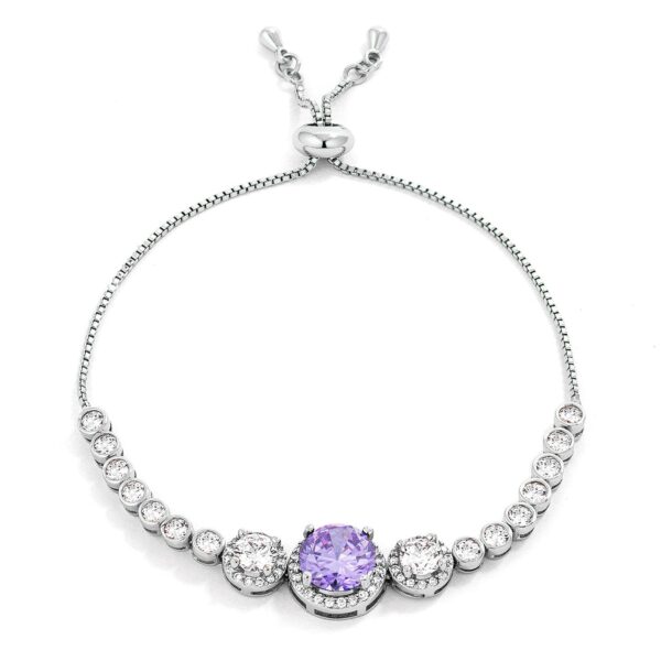Bracelet with graduated round lavender and clear cubic zirconia stones on a silvertone band