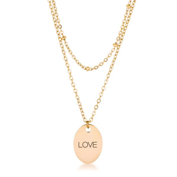 Double chain necklace with an oval pendant engraved LOVE in a gold tone