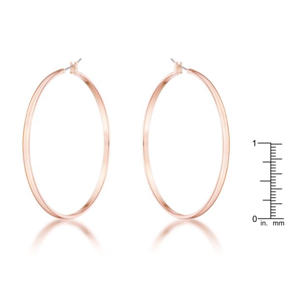 Rose gold plated hoop earrings displayed at a different angle showing their size