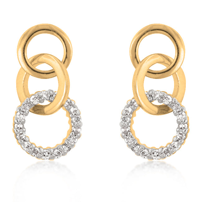 The earrings with round cubic zirconia stones set in prongs