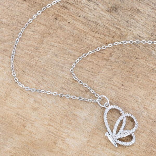Butterfly pendant necklace displayed at an angle to show light reflecting off the rhodium plating