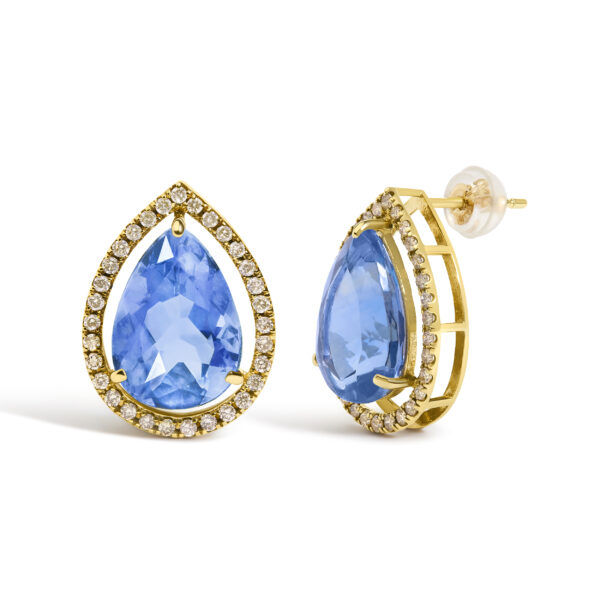 Side angle of gold stud earring showing prong setting on the blue fluorite stone