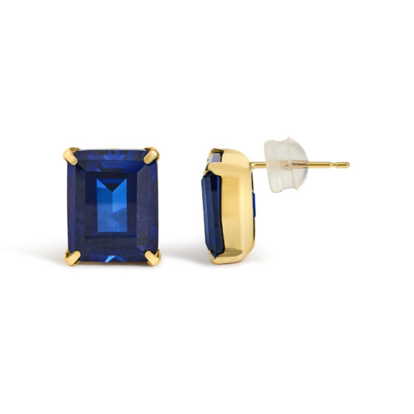 Close-up of the step-cut blue sapphire showing its step facets