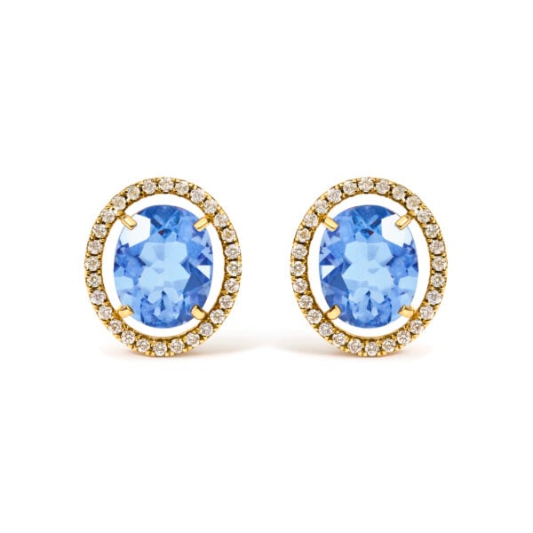 Pair of yellow gold oval stud earrings with blue fluorite centers surrounded by a diamond halo