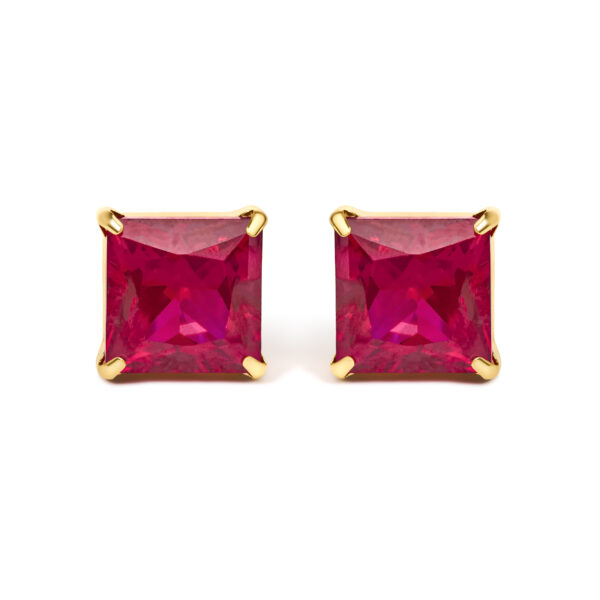 Pair of princess-cut red ruby stud earrings in 18K yellow gold, shown facing forward