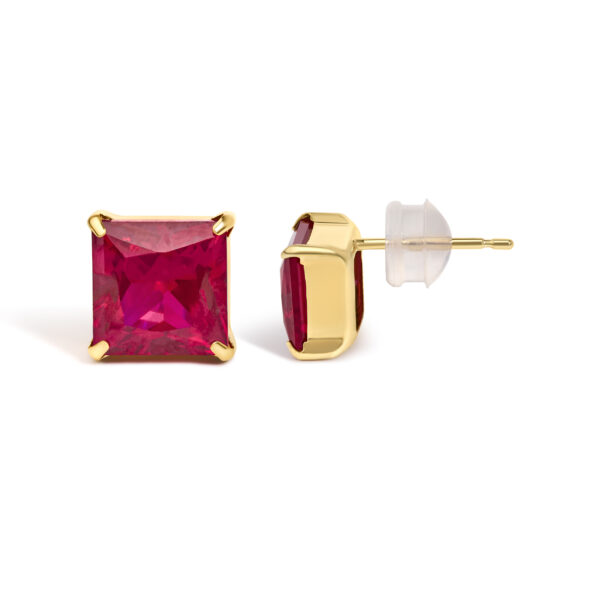 Close-up of a single ruby stud earring showing the push back closure
