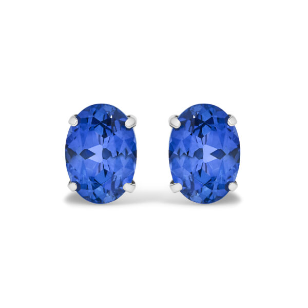 Pair of platinum stud earrings, each set with an oval blue sapphire in a 4-prong setting