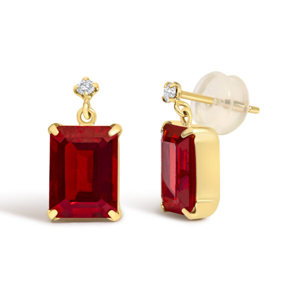 Close-up of one earring showing the rectangular garnet and prong setting