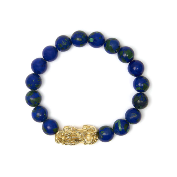 Azurite beads shown in close detail with visible natural inclusions and satin cabochon finish