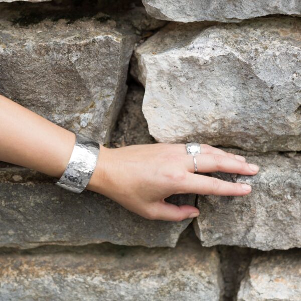 The ring displayed upright showing the full band shape