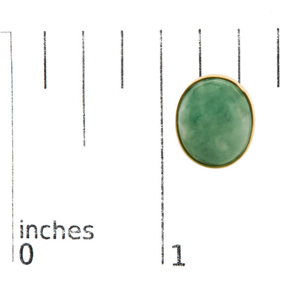 Green aventurine stud earrings shown next to a ruler for scale reference