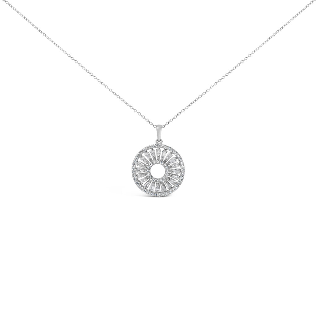Openwork medallion pendant in rhodium plated sterling silver with round and baguette diamonds, on a cable chain