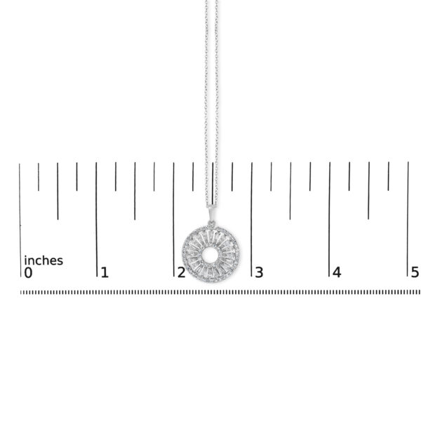 Sterling silver medallion pendant necklace shown at scale to indicate its size