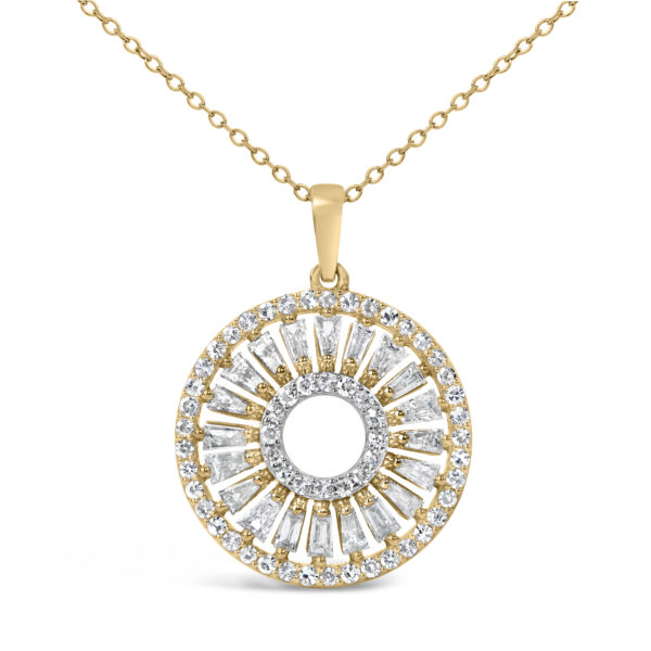 Close view of the medallion pendant showing prong-set baguette and round diamonds
