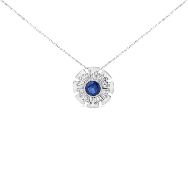 Sunburst pendant necklace with a bezel-set blue sapphire center and baguette diamond rays on a cable chain