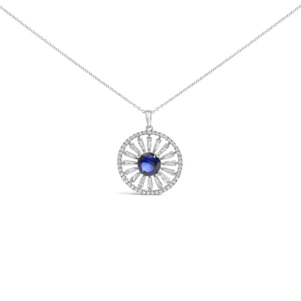 Medallion pendant with round blue center sapphire framed by baguette and round diamonds, on a cable chain