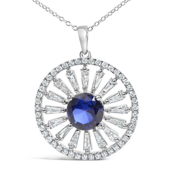 Close-up of the pendant showing the prong settings holding the sapphire and surrounding diamonds