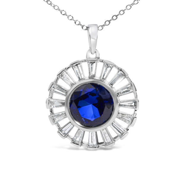 Close-up of the pendant showing the bezel-set blue stone and surrounding diamond channel setting