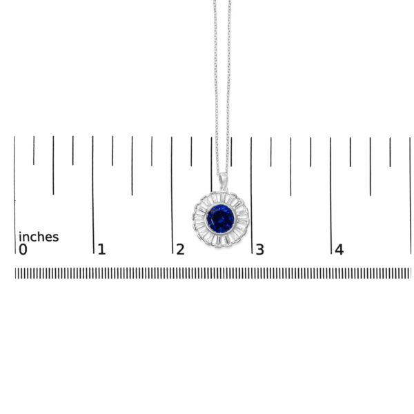 Pendant shown next to a scale reference to indicate its size
