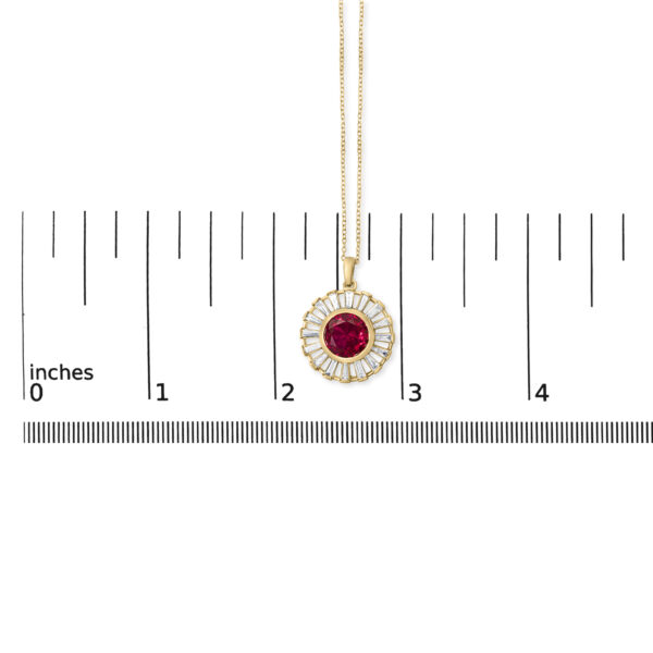 Medallion pendant shown against a scale reference to indicate its size