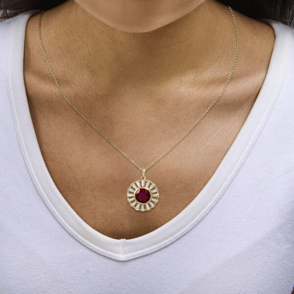 Medallion pendant on its chain as worn at the collarbone