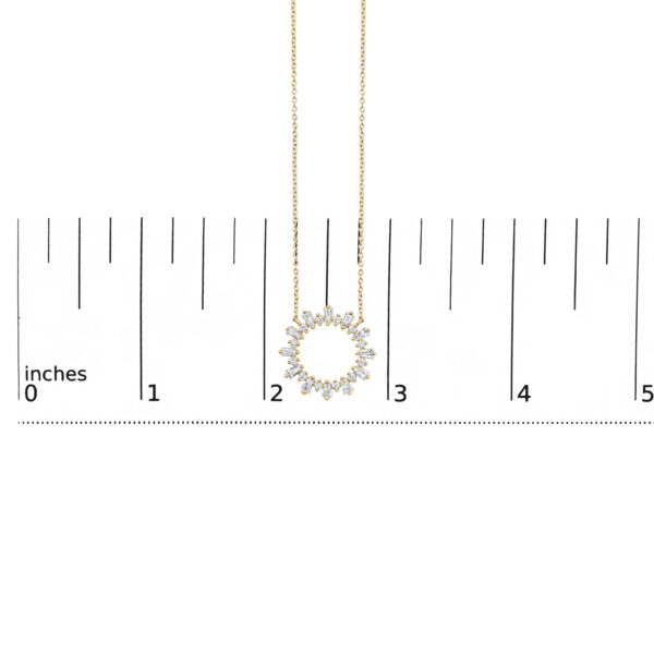 Pendant shown with a scale reference to indicate its size