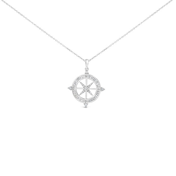 Compass medallion pendant with channel-set baguette diamonds around the rim and a cable chain