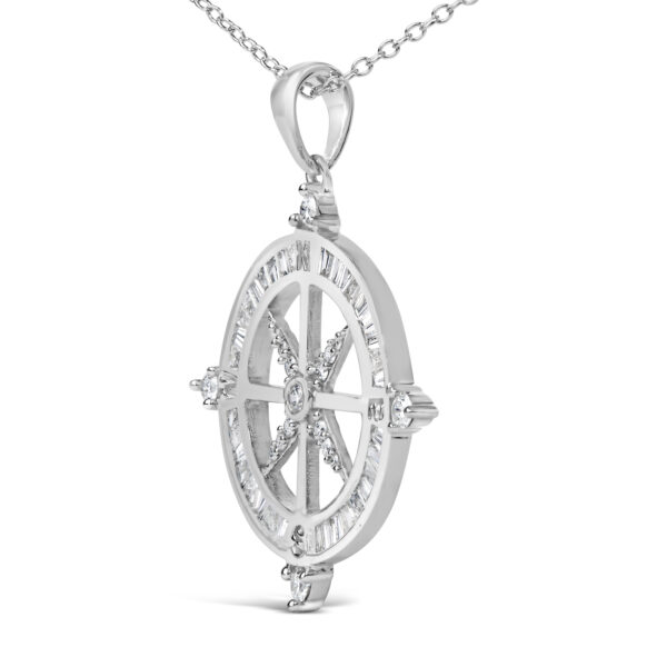 Side view of the compass medallion pendant and bail on its cable chain