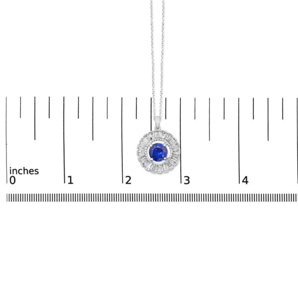 Pendant shown next to a scale reference to indicate its size